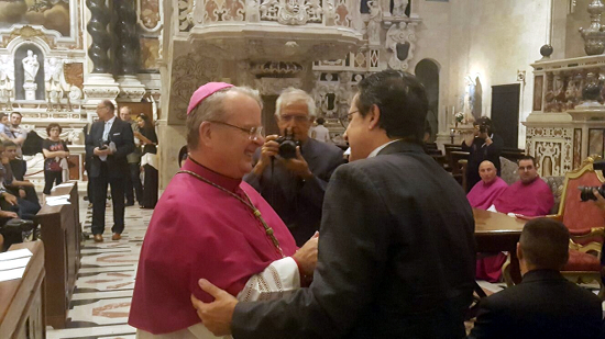 Il Presidente della Comunità Giuliano e l'Arcivescovo yyy